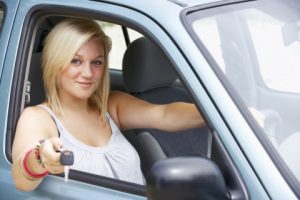 drive more efficiently, Young driver in car drive more efficiently, Young driver in car