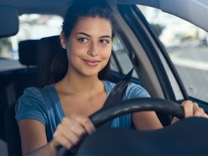 Women Drivers - Female driver behind the wheel Women Drivers - Female driver behind the wheel